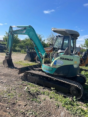 Excavator CASE pe roti, buldoexcavator si Bobcat excavator Yanmar - imagine 6