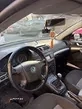 Skoda Octavia 1.6 FSI Edition 100 - imagine 4