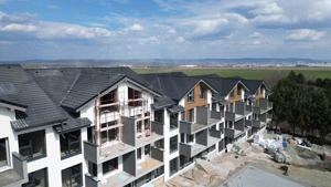 Apartament modern 49.7 mp utili 2 camere si curte 50 mp in Da Vinci