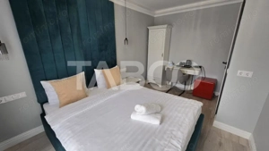 Pensiune de vanzare cu 11 camere 9 bai filigorie parcari zona Turnisor - imagine 2