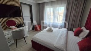 Pensiune de vanzare cu 11 camere 9 bai filigorie parcari zona Turnisor - imagine 6