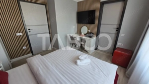 Pensiune de vanzare cu 11 camere 9 bai filigorie parcari zona Turnisor - imagine 5