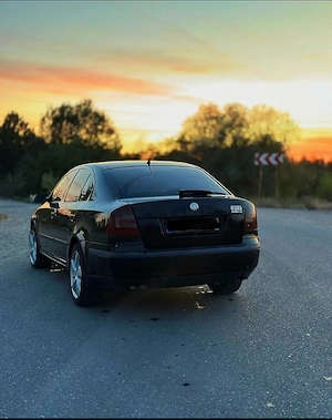 Skoda octavia 2 - schimb cu moto auto benzină după 2010 + diferență din partea mea - imagine 5