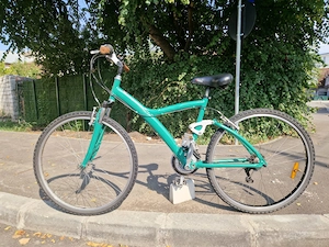 Vand bicicleta full suspension btwin pentru oras