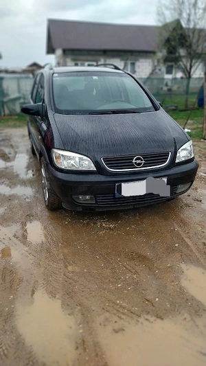 vand sau schimb opel zafira 7 locuri 2.0  diesel adusa din austrie  anul 2002