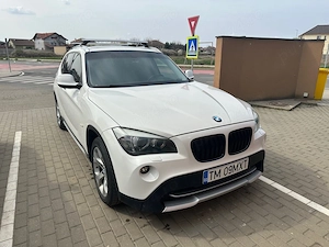 BMW X1 xDrive20d,  an 2011, 260.000km - imagine 4