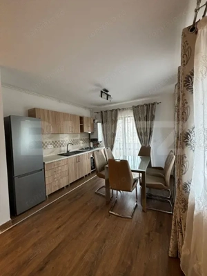 APARTAMENT CU 2 CAMERE , ZONA ISU , LOC DE PARCARE INCLUS  - imagine 3