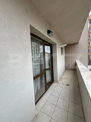 APARTAMENT CU 2 CAMERE , ZONA ISU , LOC DE PARCARE INCLUS  - imagine 4