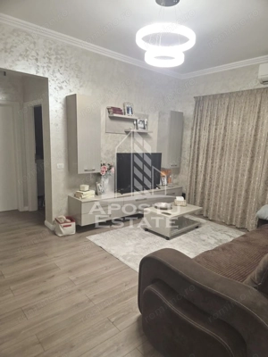 Apartament cu 3 camere si 2 bai, mobilat si utilat in Giroc la asfalt.