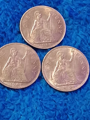 monede Elizabeth.II. britanice de un penny din anul 1964.