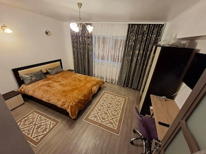  De închiriat 2 camere zona 1 Mai cu centrala termica  - imagine 2