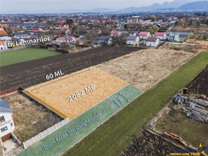 2.082 mp teren intravilan Stupini, zona de case,utilitati in apropiere,40 euro mp.