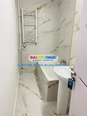 Vanzare garsoniera renovata  etaj 7 ,BLOC MIXT zona 1 DECEMBRIE