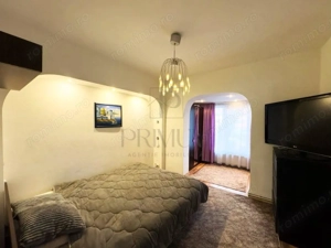 BUZIASULUI - PARTER - BLOC IZOLAT - 3 CAMERE - 2 BAI - 2 BALCOANE - CENTRALA PROPRIE - CLIMA - imagine 3