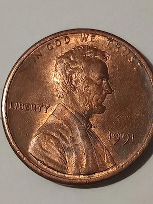 vând monedă de colecție anu 1991  de 1 cent american SUA (Lincoln Penny) 