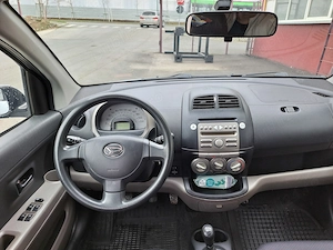 Daihatsu Sirion 1.0 benzina 2006 - imagine 7