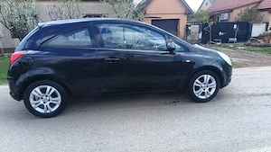 Opel Corsa D 2009 1.2benzina - imagine 3