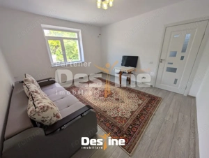 Apartament central cu 2 camere etaj intermediar 41 mp baie cu geam, renovat