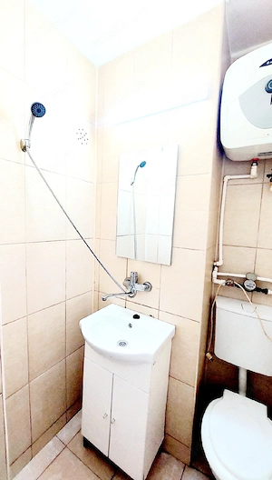Nou!!! Închiriez garsoniera confort 3 in zona centrală din Micro 14 - imagine 4