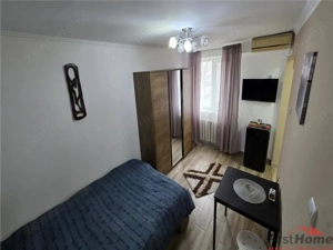 Garsoniera de vanzare zona piata sud, etaj 3 4 mobilata si utilata - imagine 2