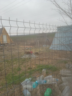 Vind teren intravilan Lilieci lîngă Bacau 584mp,29,5*20m +60 mp cale acces cu căsuța lemn 8,5mleagăn - imagine 4