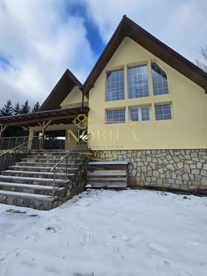 CASA DE VACANTA  CU TEREN DE VANZARE HARJA