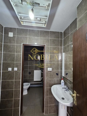 CLADIRE INDIVIDUALA ( SPATIU COMERCIAL) CU TEREN DE VANZARE IN ONESTI - imagine 15