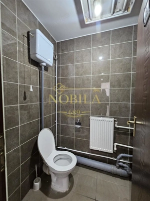 CLADIRE INDIVIDUALA ( SPATIU COMERCIAL) CU TEREN DE VANZARE IN ONESTI - imagine 18