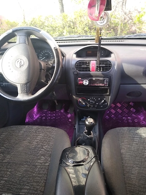 vând Opel CORSA c motor de 1 2 benzina consum mic acte valabile fiscal - imagine 5