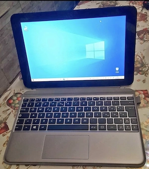 ASUS Intel(R) Atom x5 - Z 8350 tabletă 2 în 1 CPU 1.44GHz  SSD 128GB 4GB rami