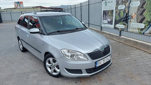 skoda fabia 1.6tdi An 2012.euro5,scaune incalzite,climatronic,senzori parcare,editie family - imagine 9