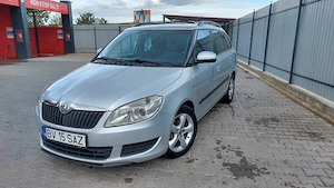 skoda fabia 1.6tdi An 2012.euro5,scaune incalzite,climatronic,senzori parcare,editie family - imagine 8