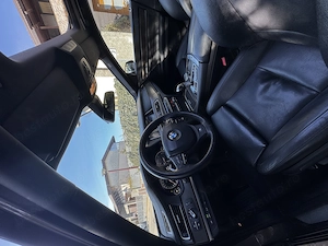 B MW Seria 7 740d xDrive - imagine 6