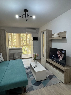 Garsoniera de inchiriat, zona linistita in Decebal, modern mobilata si amenajata, cu A C