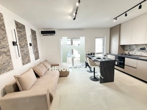 Apartament mobilat cu designer cu 2 camere si gradina in Braytim