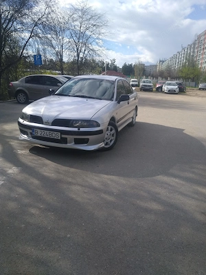 vând Mitsubishi carisma motor de 1 6 benzina acte valabile merge impecabil  - imagine 6