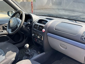 Renault Symbol 1.5 2006 82 hp - imagine 6