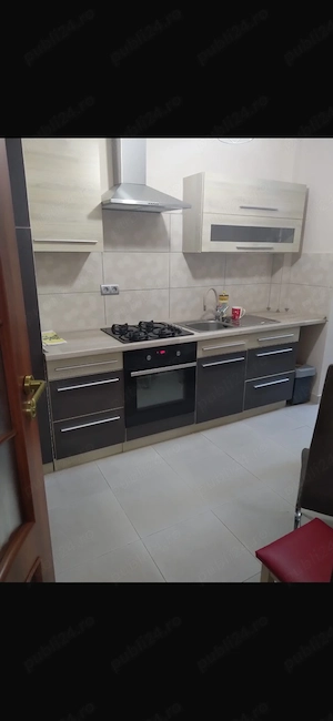 Închiriez apartament 2 camere - imagine 6