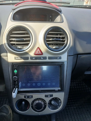 Opel Corsa D 1.2 benzina   2010 - imagine 7