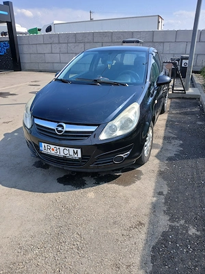 Opel Corsa D 1.2 benzina   2010 - imagine 4