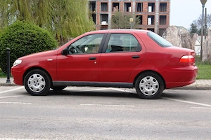 Fiat Albea roșie 105000 km 2009, aer conditionat, multimedia