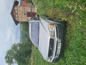 Mașină familială cu 7 locuri - imagine 4