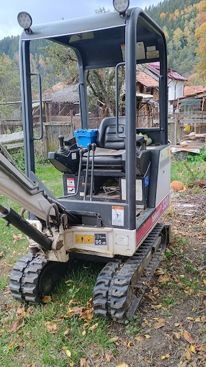 vând bobcat 320 - imagine 5