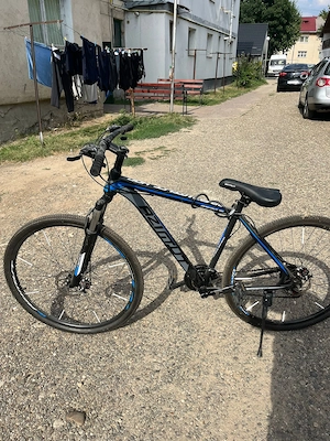 De vânzare bicicleta 
