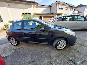 Peugeot 206+ 1.1 benzina cu AC - imagine 2