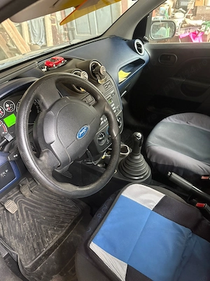 Ford Fiesta 1.6 tdci 73000 km reali unic proprietar! - imagine 10