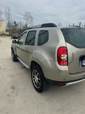 Dacia Duster 1.5dci   110 Cp 4x4 An 2012 - imagine 4