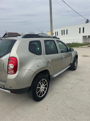 Dacia Duster 1.5dci   110 Cp 4x4 An 2012 - imagine 9