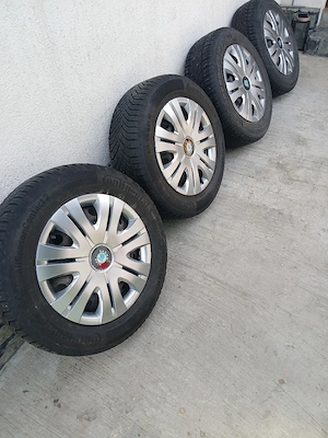 Anvelope noi iarna cu jante cu tot cu capace  originale skoda - imagine 4