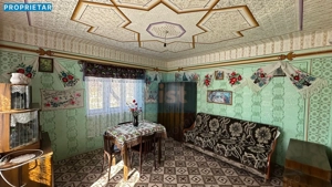 Casă din cărămidă cu anexă și teren 33 ari in Mănău, Maramureș